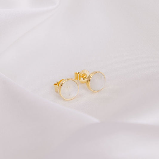 moonstone studs on a white cloth